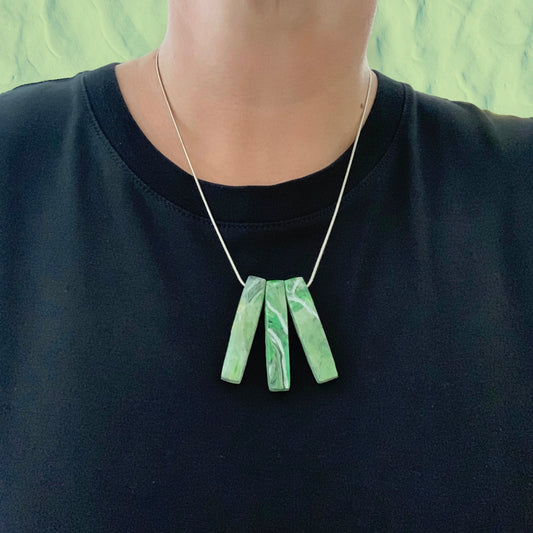 perfect gift green bar necklace handmade form recycled bottle tops in London artesian