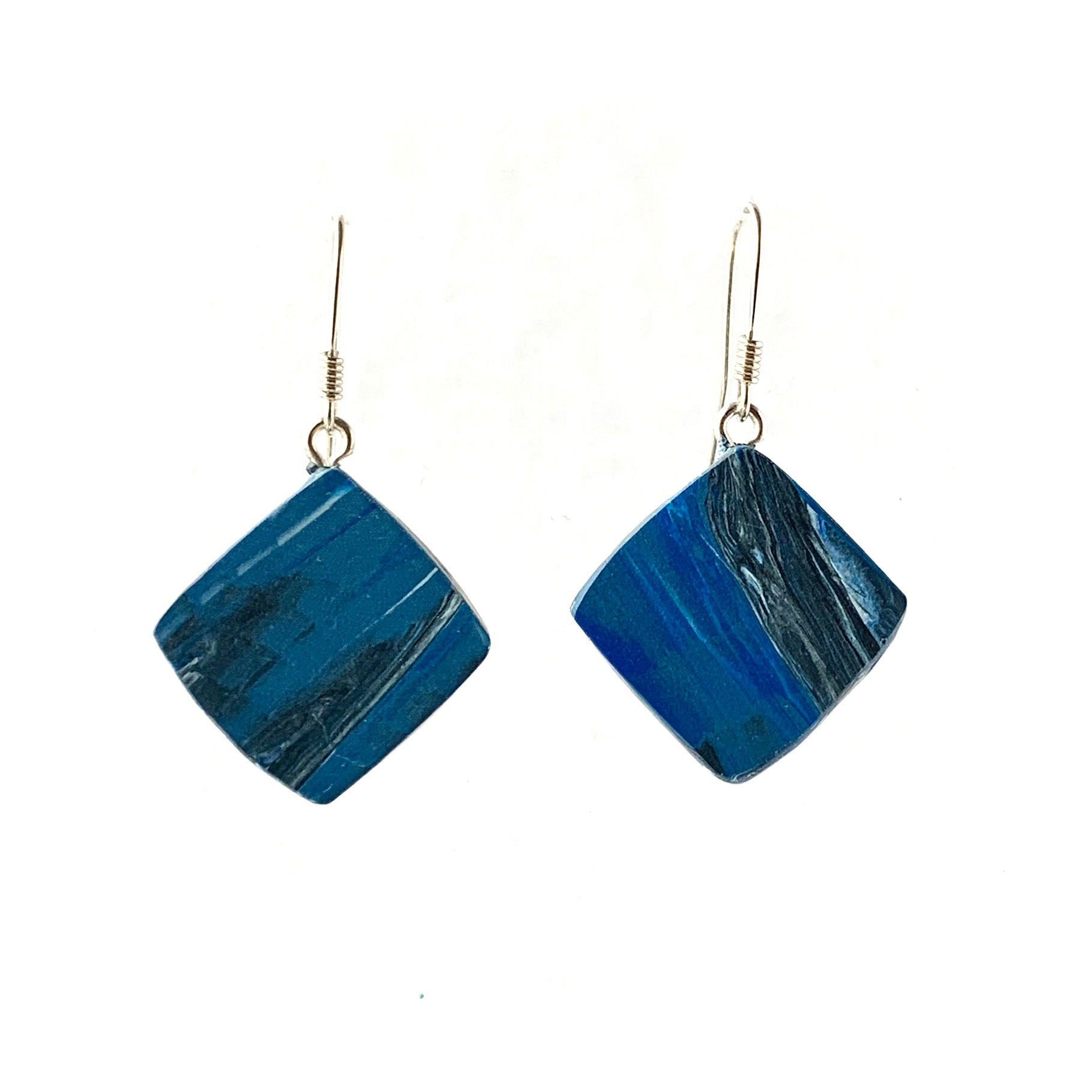 Handmade jewellery drops from recycled bottle tops