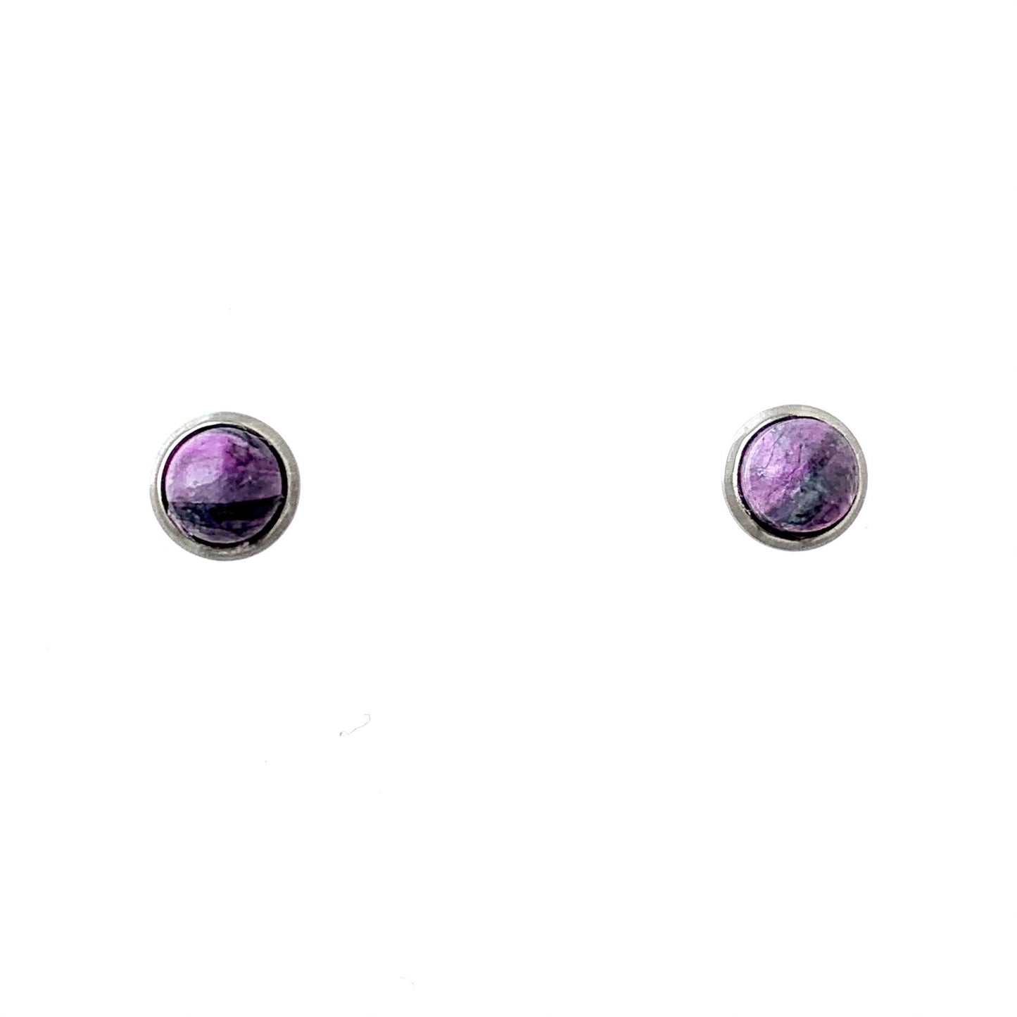 Small purple studs handmade from recycled plastic