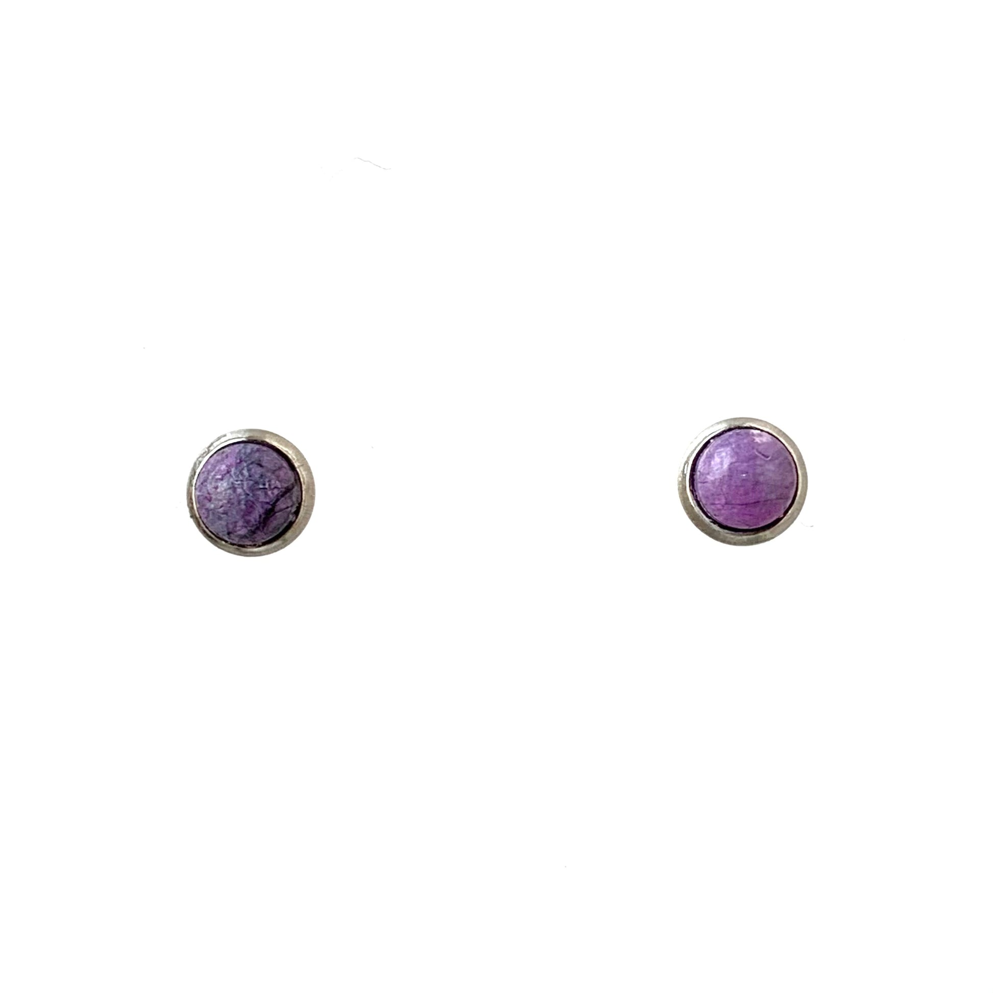 Small purple studs handmade from recycled plastic
